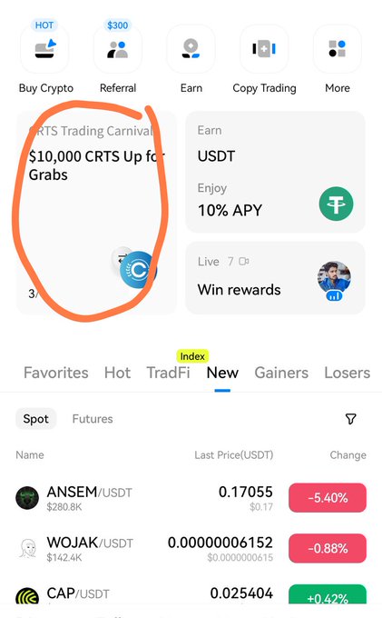 Screenshot of a crypto exchange app showing a circled promotion for 'CRTS Trading Carnival' offering '$10,000 CRTS Up for Grabs', with meme coins listed below including ANSEM, WOJAK, and CAP trading pairs against USDT.