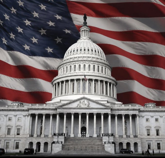 The image shows the United States Capitol building overlaid with a large, waving American flag, symbolizing national government and American political authority. This visually reinforces the post's message about President Trump attending a Crypto Summit alongside SEC and CFTC leaders, emphasizing that cryptocurrency policy is now a top federal priority with major industry figures like Coinbase, Ripple, a16z, and Chainlink convening at the highest level of U.S. governance.