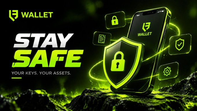 A promotional graphic for 'WALLET' with the tagline 'STAY SAFE - YOUR KEYS. YOUR ASSETS.' featuring a smartphone with security icons and a glowing shield.