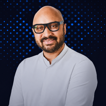 Eman Abio, Co-Founder, smiles in this image. He is featured in a post announcing the next chapter of Sui's finance will be revealed at $SUI Basecamp in Oct 2026.
