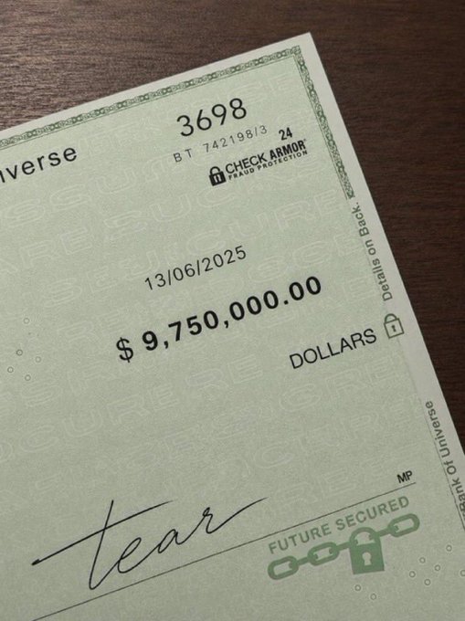 A check from "CHECK ARMOR" dated 13/06/2025, made out to "iverse" for $9,750,000.00 sits on a dark surface, its "SECURE" watermark and "FUTURE SECURED" padlock graphics reinforcing the post's message that a personal fortune of nearly $10 million is within reach as the beginning of a new financial legacy.