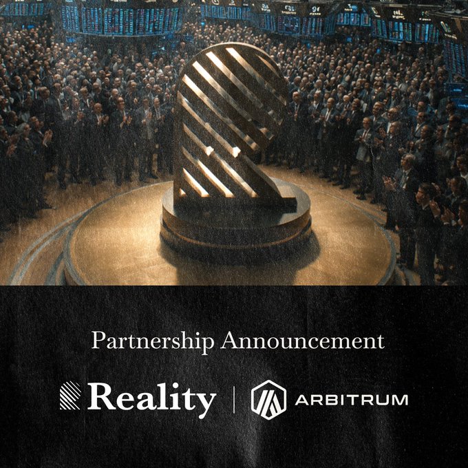 The image features a large crowd of people gathered around an impressive sculpture or statue, which appears to be made out of wood with a unique design resembling a head. The scene takes place at a public event where many individuals are standing close together, observing the artwork. In the background, there is a sign that reads "Partnership Announcement" and another sign that says "Reality". These signs suggest that this gathering could be related to an art exhibition or a similar event showcasing artistic creations. The image also includes text about tokenized real-world assets and how they are integrated into the broader onchain infrastructure, which indicates that the event might have some connection to the world of cryptocurrency or digital assets.