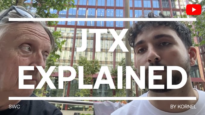 A YouTube video thumbnail titled 'JTX EXPLAINED' showing two men in front of a glass building, credited to 'SWC' and 'BY KORNEL'.