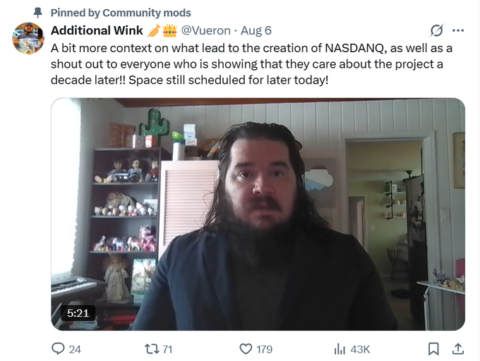 A pinned tweet from @Vueron (Additional Wink) dated August 6 features a 5:21 video still of a bearded man in a home with shelves of figurines, addressing followers about the origins of the NASDANQ meme project and expressing appreciation for ongoing support. The post references the $NASDANQ token and its satirical roots as a "meme stock market" parody from Reddit's MemeEconomy subreddit, with the video serving as direct commentary from a community figure on that very lore.