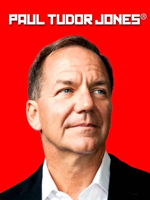 A portrait of a middle-aged man in a dark suit against a bright red background, with the text 'PAUL TUDOR JONES®' displayed at the top.