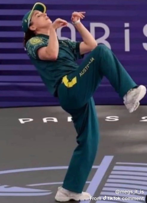 An athlete in an Australian team tracksuit performing an exaggerated mid-air pose, captured from a TikTok video at the Paris Olympics.