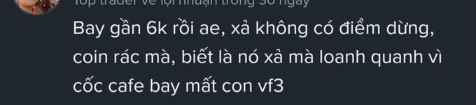 A screenshot of a Vietnamese social media comment complaining about losing nearly 6k in a scam, criticizing the worthless 'coin' and 'vf3' product.
