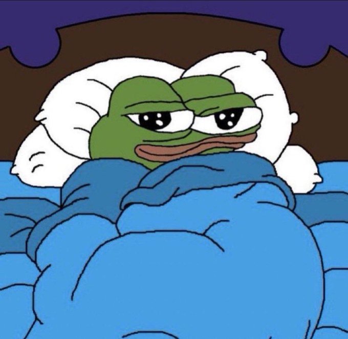 An edited image of Pepe the Frog with wide, cartoonish eyes peeking out from under blue bed covers.