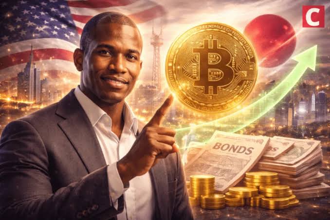 A promotional image featuring a smiling Black man in a suit pointing toward a large golden Bitcoin coin, with American and Japanese flags, a city skyline, gold coins, and documents labeled 'BONDS' and 'US' in the background.