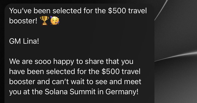 "@SuperteamDE" is a person's name that is being sent along with a thumbs up or positive message about their selection for the $500 travel booster email.