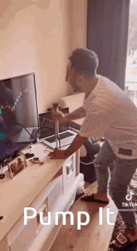 The image shows a man standing next to a television, holding a remote control as if he's about to pump up some air into an object or play a game. The text "What's your price prediction for the $SPCX stock fam?" is present in the image, which could be related to a stock market analysis or a gaming event involving stock trading simulations.

The post also mentions that there are two people playing a video game on a TV and asks if anyone else wants to join them. The text "What's your price prediction for the $SPCX stock fam?" is likely meant as a humorous question, possibly related to a stock market analysis or a gaming event involving stock trading simulations.