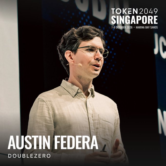 A promotional graphic for TOKEN 2049 Singapore (7-8 October 2026, Marina Bay Sands) featuring a speaker named AUSTIN FEDERA from DOUBLEZERO.