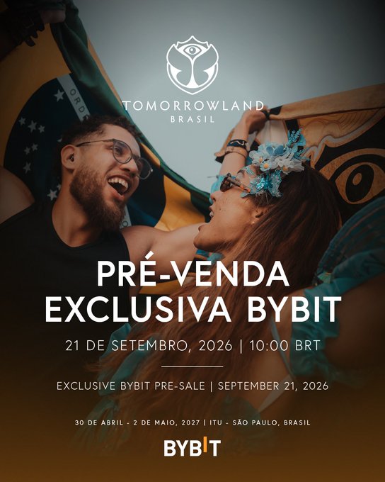 A promotional poster for Tomorrowland Brasil's Exclusive Bybit Pre-Sale, featuring a joyful couple (one wearing glasses and the other a blue flower crown) celebrating beneath the festival's eye logo and the Brazilian flag, with text announcing pre-sale access on September 21, 2026 at 10:00 BRT and event dates of April 30–May 2, 2027 in Itu, São Paulo, Brazil. The image visually reinforces the post's message by showcasing the festival's vibrant, communal atmosphere to entice Bybit Card holders to secure early ticket access.