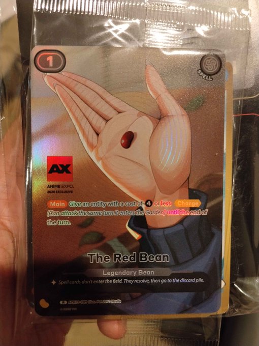 This Anime Expo exclusive Azuki TCG card features "The Red Bean," a Legendary Bean with a cost of 4 or less. The card's name and imagery directly relate to the popular Azuki NFT project, aligning with the post's sentiment of "It's still everything Azuki."
