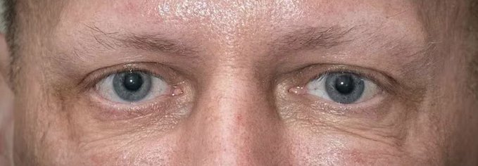Close-up of a man's wide, startled blue eyes staring directly at the camera, conveying intense shock. The image humorously illustrates the post's "POV" of someone delivering shocking news, with the dramatic expression suggesting the gravity of "turning off the $ETH suppression machine" and "Nephilim CONFIRMED."