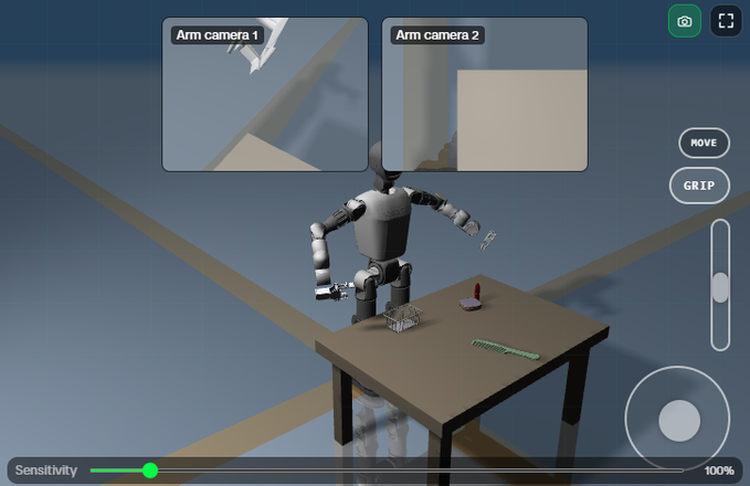 The image shows a robot standing at a table with two arms, one of which has a camera attached to it. The robot appears to be interacting with an object placed on the table, possibly using its camera for guidance or control. The background is blue, providing a contrast to the gray color scheme of the robot and the table.