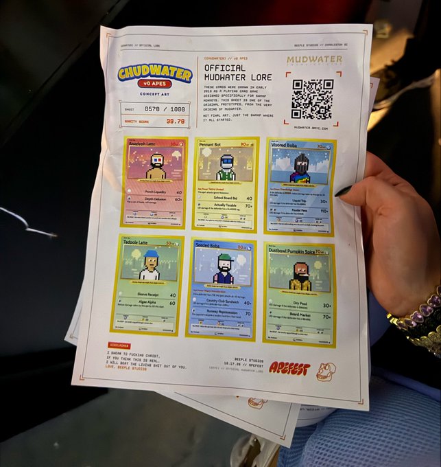 A hand holding a printed document titled 'OFFICIAL MUDWATER LORE' from the 'CHUDWATER VS APES' concept art collection, featuring pixel-art character cards with stats and a QR code, marked '0578/1000' with 99.7% rarity.