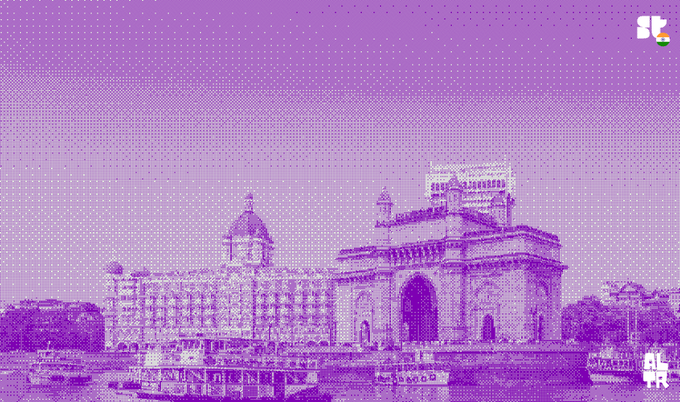 The image shows the Gateway of India in Mumbai with the iconic Taj Hotel in the background, stylized with a purple halftone effect, promoting a Superteam BOM coworking event. The "ST" logo with an Indian flag appears in the corner, tying the iconic landmark to the Mumbai-based "gm" and team meetup invitation.