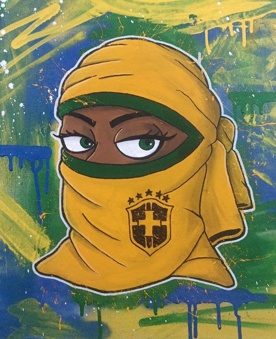 A stylized cartoon illustration shows a character wrapped in a yellow hooded garment with a crest on the front, set against a colorful painted background with dripping paint effects.