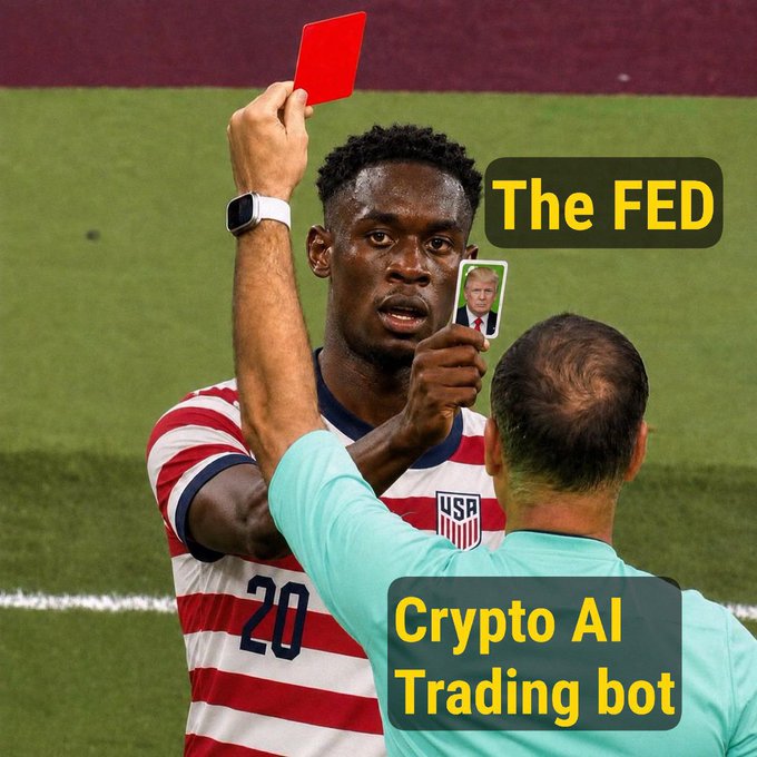 The image shows a US soccer player (wearing #20, Folarin Balogun) receiving a red card from a referee, edited with the referee holding a card showing Trump's face instead, with labels "The FED" on the player and "Crypto AI Trading bot" on the referee.

The meme illustrates the bearish crypto market sentiment: just as the US national team player is being unfairly "red-carded" by an AI bot representing the Federal Reserve (personified by Trump), crypto AI trading bots are getting unfairly punished/taken down by Fed actions in the down market.