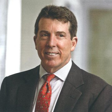 Former Barclays CEO Bob Diamond, seen here in a professional headshot wearing a dark suit and red tie, is shown in connection with his recent comments identifying Circle and Hyperliquid as likely infrastructure winners from the CLARITY Act.