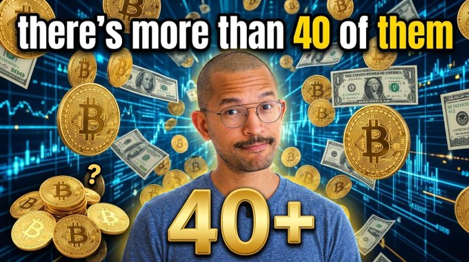 A man with glasses and a mustache stands in front of a backdrop featuring gold Bitcoin coins, US dollar bills, and blue stock chart graphics, with bold text reading "there's more than 40 of them" and "40+" overlaid on the image, suggesting the video discusses over 40 cryptocurrency-related developments that could impact Bitcoin and the broader crypto market.
