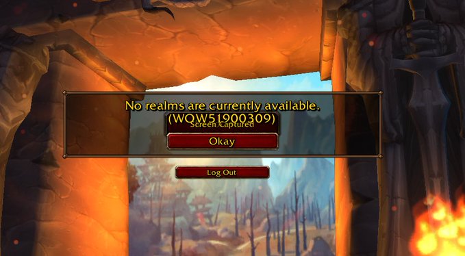 A World of Warcraft login screen showing an error message that reads 'No realms are currently available. (WOW51900309)' with 'Okay' and 'Log Out' buttons, set against a fiery cave background.