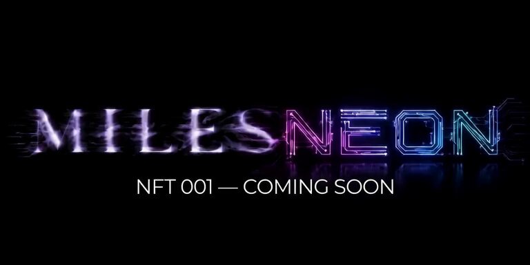 The image features a neon sign that says "Miles Neon" written in purple, blue, and white colors. The background of the image is black with neon lights shining through. Below the neon sign, there's text that reads "NFT 001 - Coming Soon". This suggests that the neon sign is related to an upcoming NFT (Neon Artwork Fine Arts) event or release.