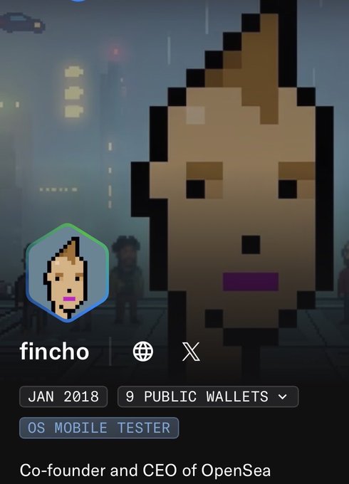 A crypto/NFT profile screen showing a pixel art avatar of a person, with stats indicating 'JAN 2018', '9 PUBLIC WALLETS', 'OS MOBILE TESTER', and the bio 'Co-founder and CEO of OpenSea'. The username appears to be 'fincho'.