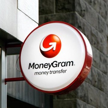 The image features a large sign that says "MoneyGram" with an arrow pointing towards a red circle containing the word "bitcoin". Below this, there's text that reads "CASH TO #BITCOIN: BREAKING! Massive mainstream adoption just dropped! The biggest cash network on the planet just flipped the switch! Payments giant MoneyGram now lets their 50,000,000 customers convert cash to Bitcoin in 100 countries!".