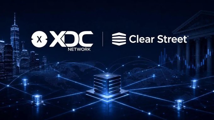 The image shows a partnership announcement graphic featuring the XDC Network and Clear Street logos prominently displayed against a dark blue digital backdrop, with illustrations of a city skyline and a financial trading chart on either side. Central to the design is a glowing 3D cube connected by network lines to smaller nodes, symbolizing blockchain connectivity and supporting the announcement of Clear Street joining as an institutional masternode validator on the XDC Network.