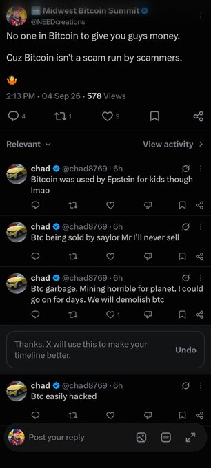 A Twitter/X post from Midwest Bitcoin Summit (@NEEDcreations) stating 'No one in Bitcoin to give you guys money. Cuz Bitcoin isn't a scam run by scammers,' with replies from user @chad8769 criticizing Bitcoin.