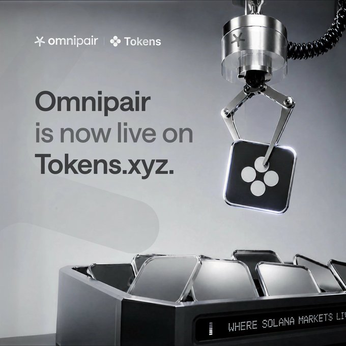 The image features a robot arm lifting an object with a square symbol on it, which appears to be a coin or token. The text in the image reads "Omnipair is now live on tokens. xyz." This suggests that the robot arm is integrated into Solana's discovery layer for top assets and can be used as collateral for trading.