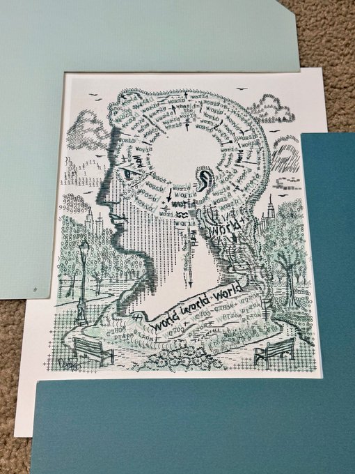 The image shows a card featuring a pen-and-ink illustration of a man's silhouette filled with repeated "world" text, with the phrase "world world world" visible on a book in the scene. The card is being framed between blue mat boards, matching the post's caption about "framing the @world_xyz for @FlashKnob."