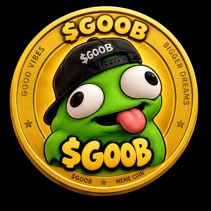 A gold coin graphic featuring a green cartoon frog wearing a black cap, with the text '$GOOB', 'GOOD VIBES', 'BIGGER DREAMS', and 'MEME COIN' inscribed on it.