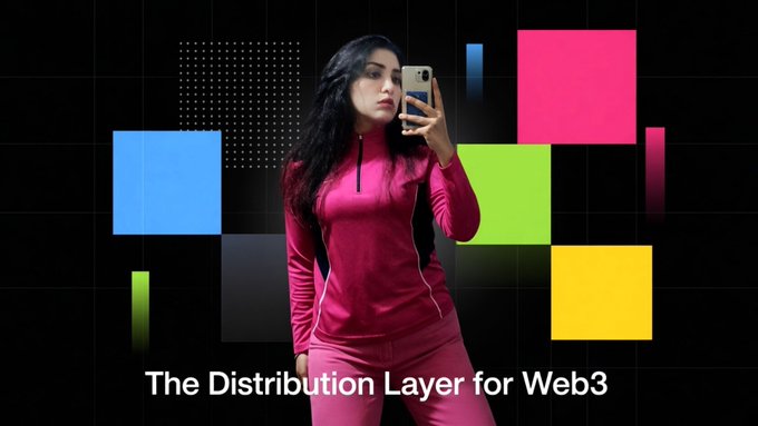 A woman in a pink tracksuit taking a selfie in front of a black background with colorful squares, with text reading 'The Distribution Layer for Web3'.