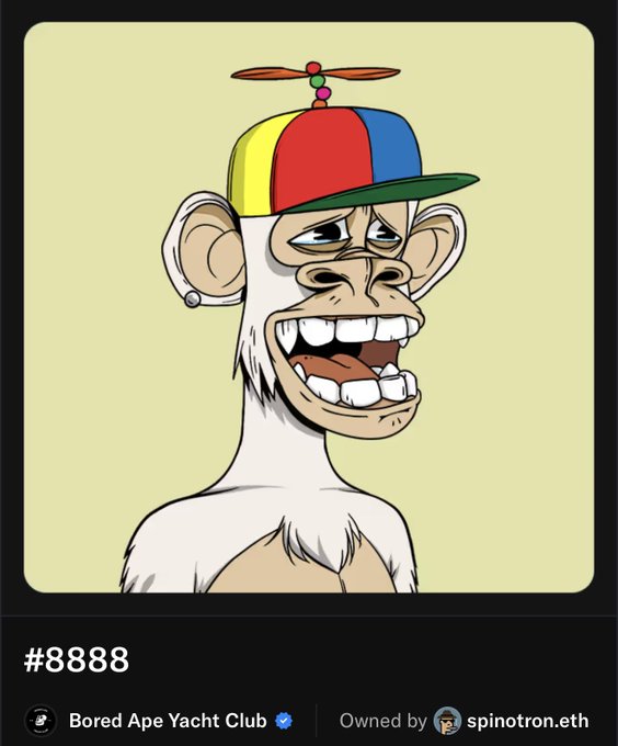 Bored Ape Yacht Club NFT #8888, owned by spinotron.eth, featuring a white ape with a propeller beanie and an earring.