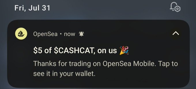 A mobile notification from OpenSea dated Fri, Jul 31 stating "$5 of $CASHCAT, on us 🎉" thanking the user for trading on OpenSea Mobile.