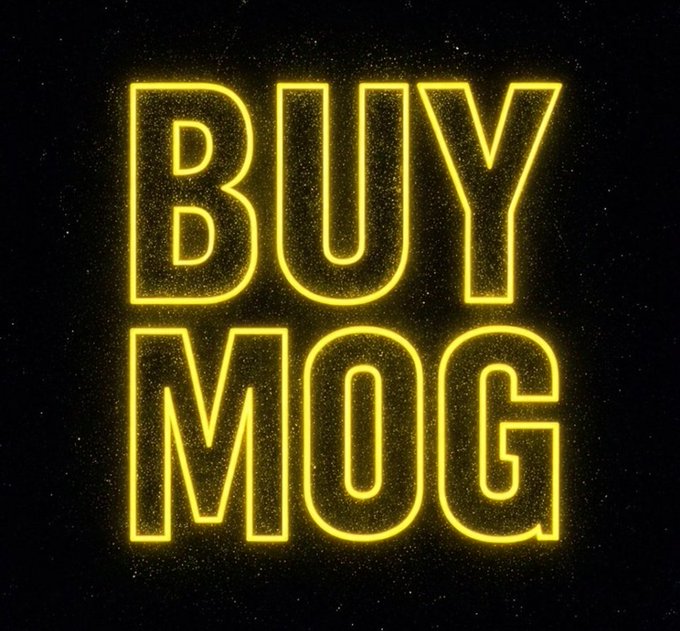 A neon yellow glowing sign on a dark, speckled background that reads 'BUY MOG'.