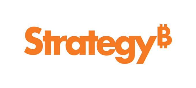 An orange logo for "Strategyᵇ" with a Bitcoin symbol incorporated into the letter "B" is displayed on a white background.