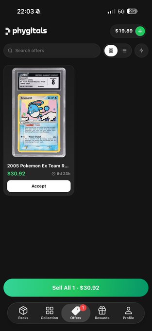 A screenshot of the 'phygitals' mobile app displaying an offer to buy a '2005 Pokemon Ex Team R...' trading card for $30.92, with a 'Sell All 1 - $30.92' button at the bottom.
