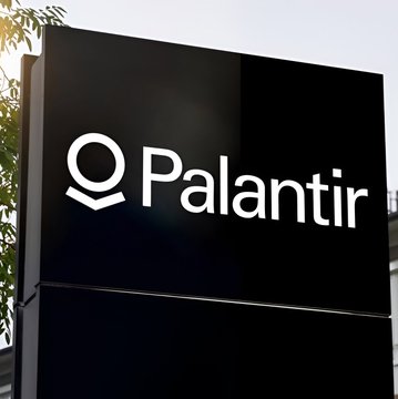 A black outdoor sign displays the white logo and name 'Palantir'.