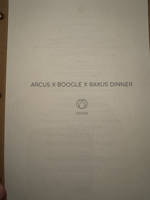 A hand holds a cream-colored menu page reading "ARCUS X BOOGLE X BAXUS DINNER" above a circular logo and the name "OUF MI," marking the start of an exclusive three-brand collaboration dinner.