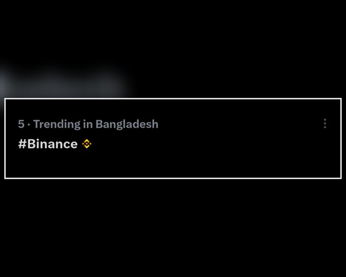 The image shows a black background with white text that reads "5 #Trending in Bangladesh". The text is centered, making it easy to read. The image also contains a small yellow symbol located at the top left corner of the screen.