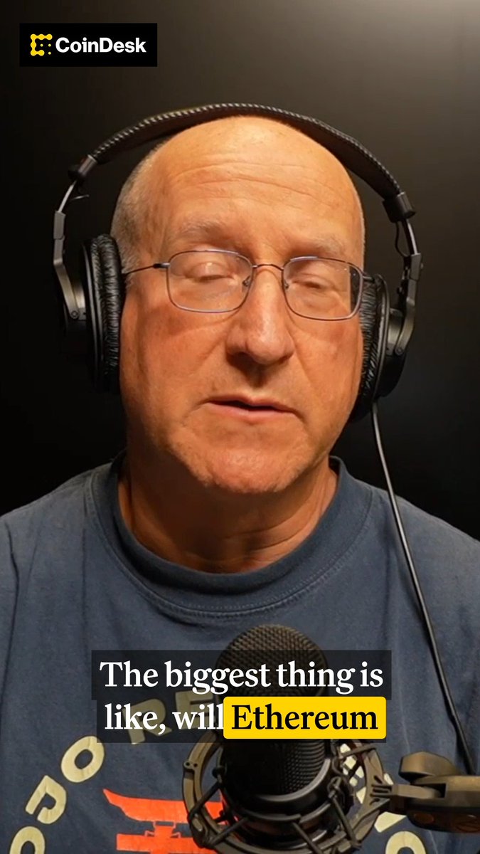 A CoinDesk video still shows a man wearing headphones and speaking into a microphone, with on-screen text reading "The biggest thing is like, will Ethereum." The image accompanies commentary from Eli Ben Sasson discussing potential future risks to Ethereum from emerging competitors.