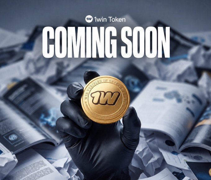 A promotional image for "1win Token" featuring a gloved hand holding a gold coin with a "1W" logo, with "COMING SOON" displayed in large white letters against a background of crumpled papers.