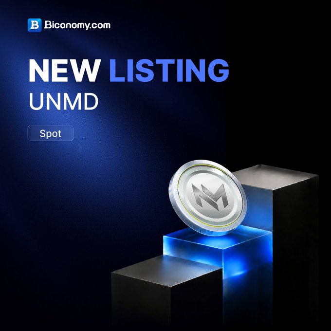A Biconomy.com exchange announcement graphic featuring 'NEW LISTING UNMD Spot' in white and blue text, showcasing a silver 3D-rendered UNMD coin on stacked metallic blocks.