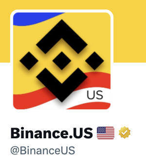 The image shows the Binance.US profile picture, featuring the Binance logo set against a stylized American flag background with "US" in the corner. This patriotic redesign aligns perfectly with the post's comment about a "very patriotic" new profile picture, as the new design incorporates red, white, and blue American flag elements to emphasize its U.S. identity.