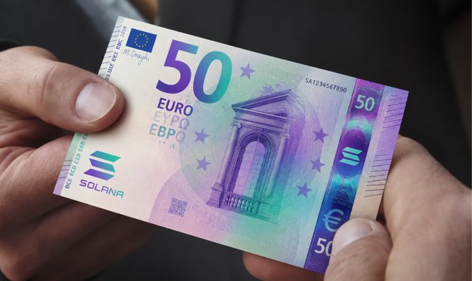 A person's hands holding a custom-designed 50 Euro banknote featuring Solana branding and the text "50 EURO / EYPΩ / EBPΩ."
