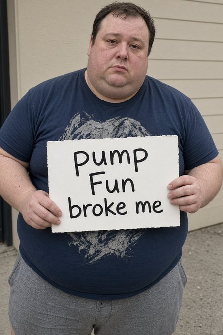 A heavier-set man wearing a blue t-shirt and grey shorts holds a white handwritten sign that reads 'pump fun broke me'.